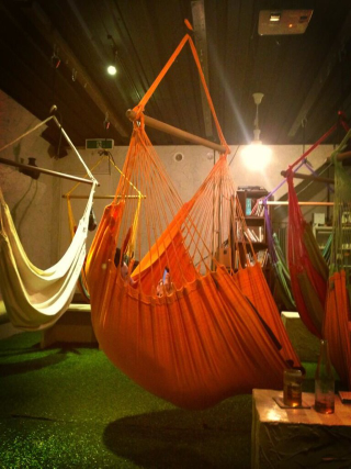 Illustration for article titled Japan's Hammock Cafes Are Perfect for Lazy People